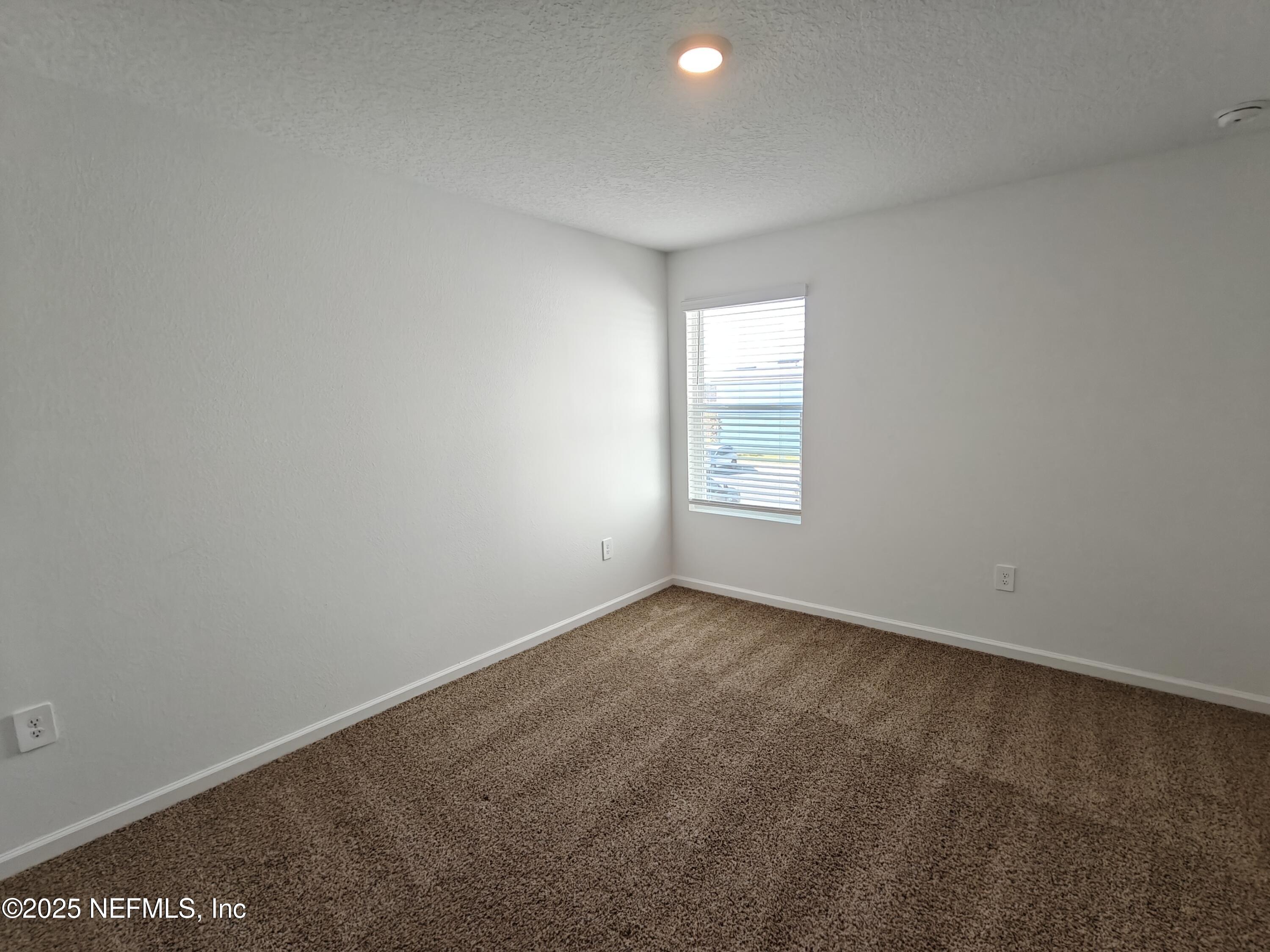 1731 Bridger Trace Middleburg, FL 32068 - Photo 36 of 43 an empty room with a window