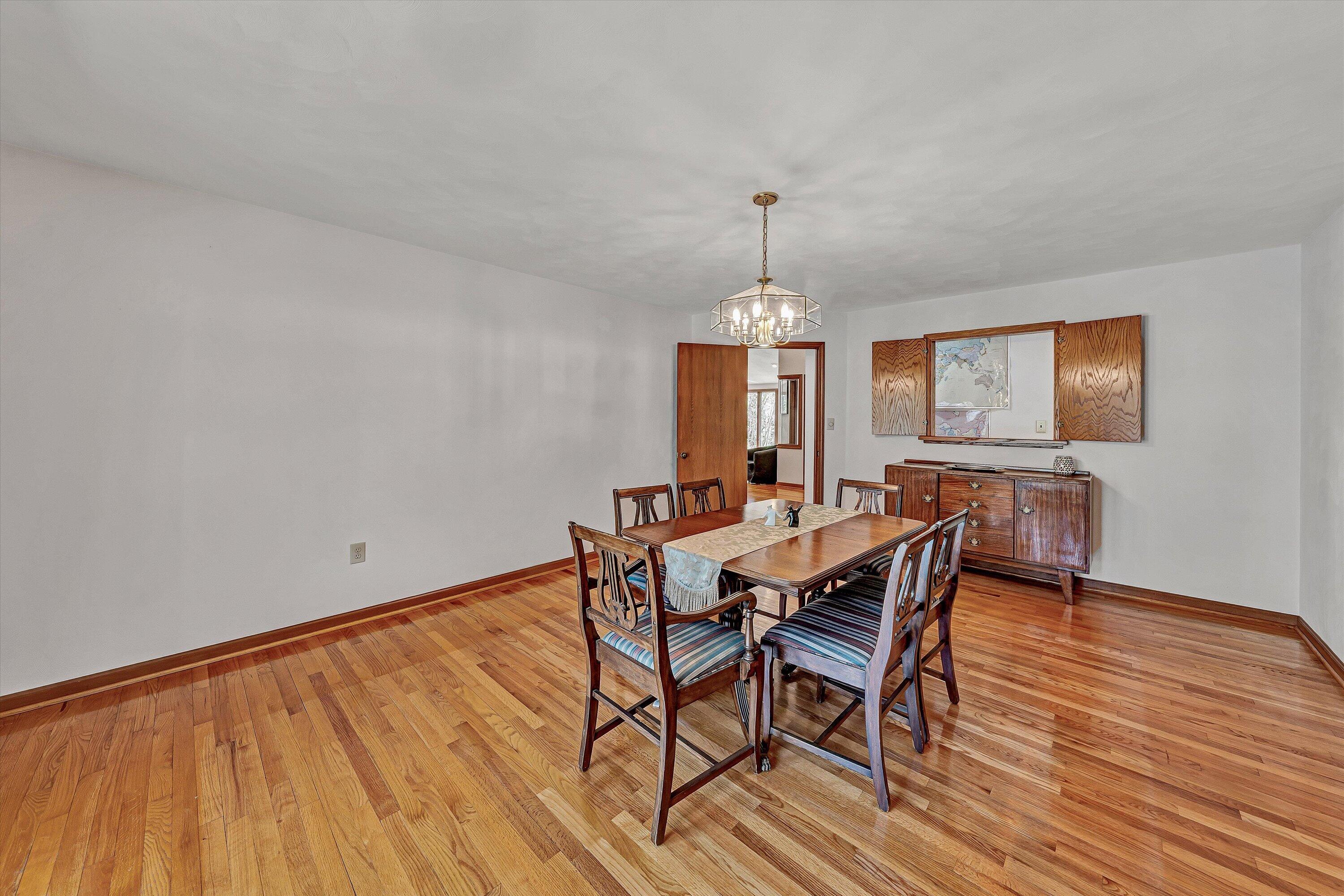 1124 Old Hollow Road Buchanan, VA 24066 - Photo 17 of 73 a view of a dining room with furniture window and wooden floor