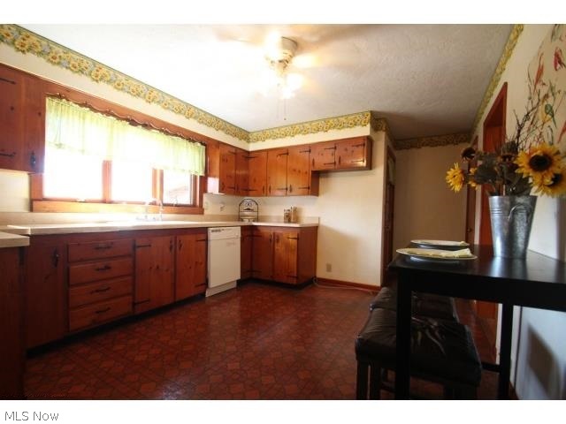 5 Prentice Road Painesville, OH 44077 - Photo 9 of 16 THIS CHEERFUL EAT IN KITCHEN WILL BE WHERE FRIENDS AND FAMILY CAN GATHER.