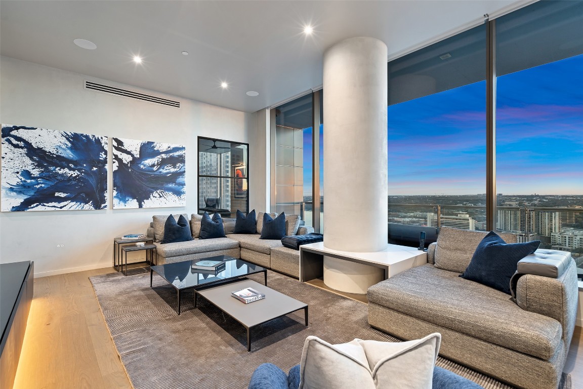 210 Lavaca Street, Unit 2301 Austin, TX 78701 - Photo 13 of 40 a living room with furniture and a large window