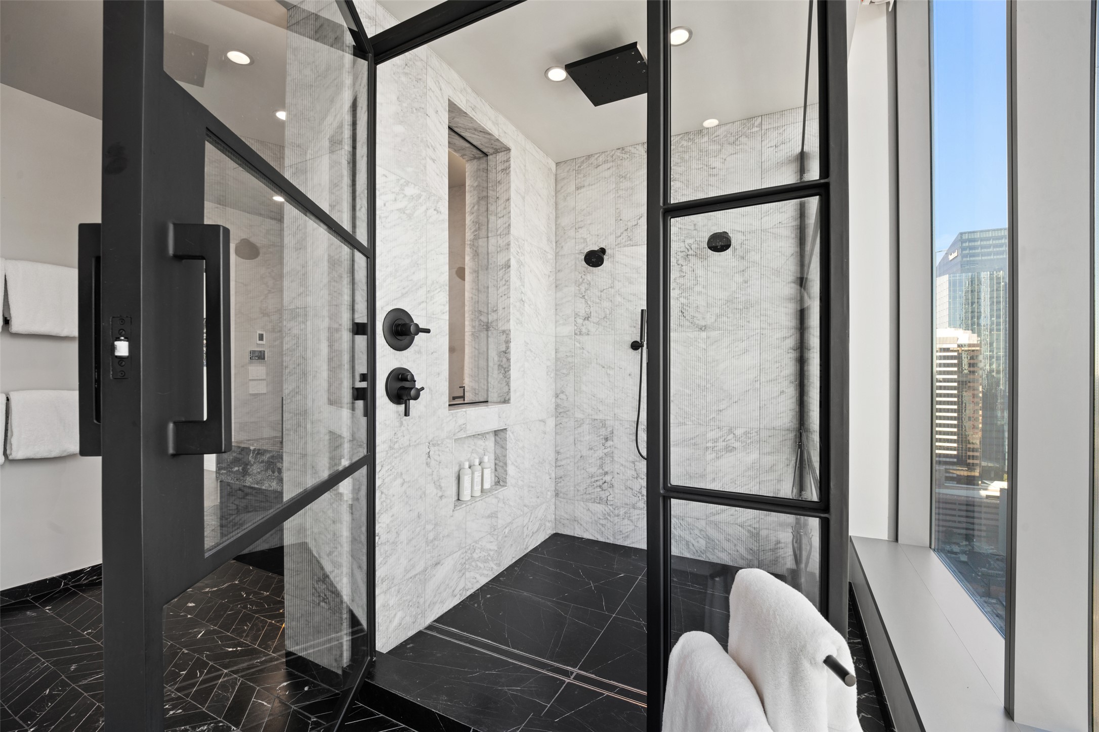 210 Lavaca Street, Unit 2301 Austin, TX 78701 - Photo 28 of 40 a bathroom with a shower