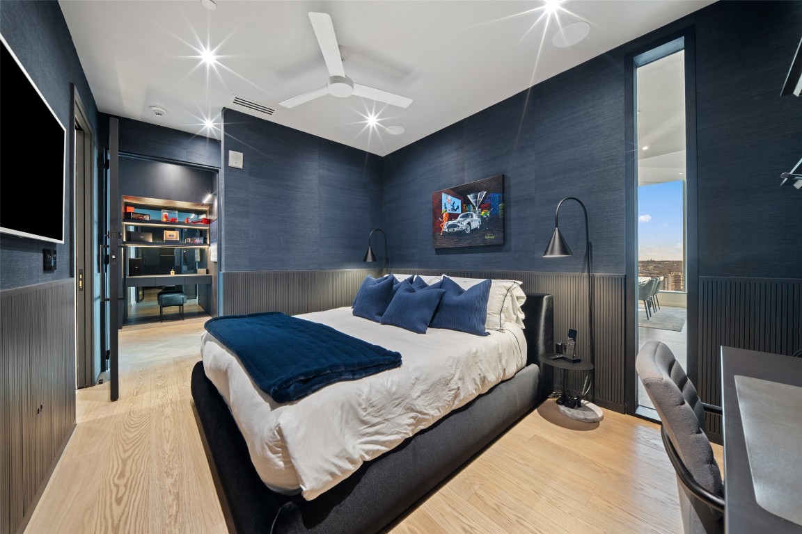 210 Lavaca Street, Unit 2301 Austin, TX 78701 - Photo 31 of 40 a bedroom with a bed and a flat screen tv