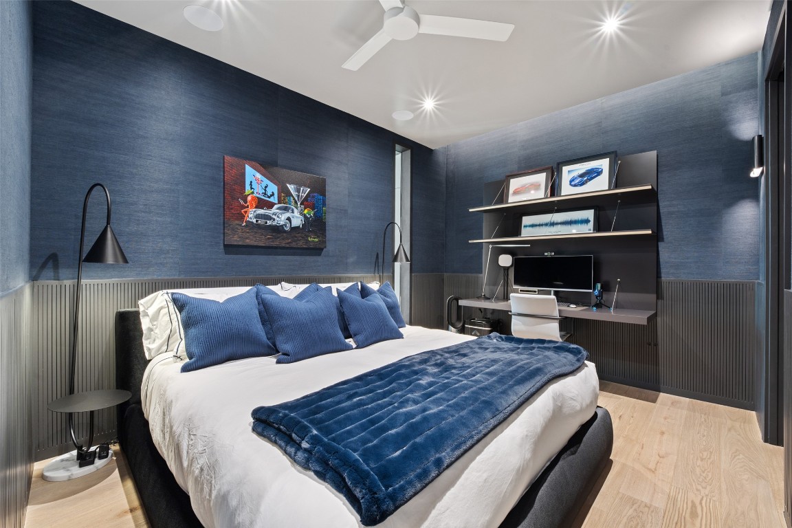 210 Lavaca Street, Unit 2301 Austin, TX 78701 - Photo 32 of 40 a bedroom with a bed and a flat screen tv