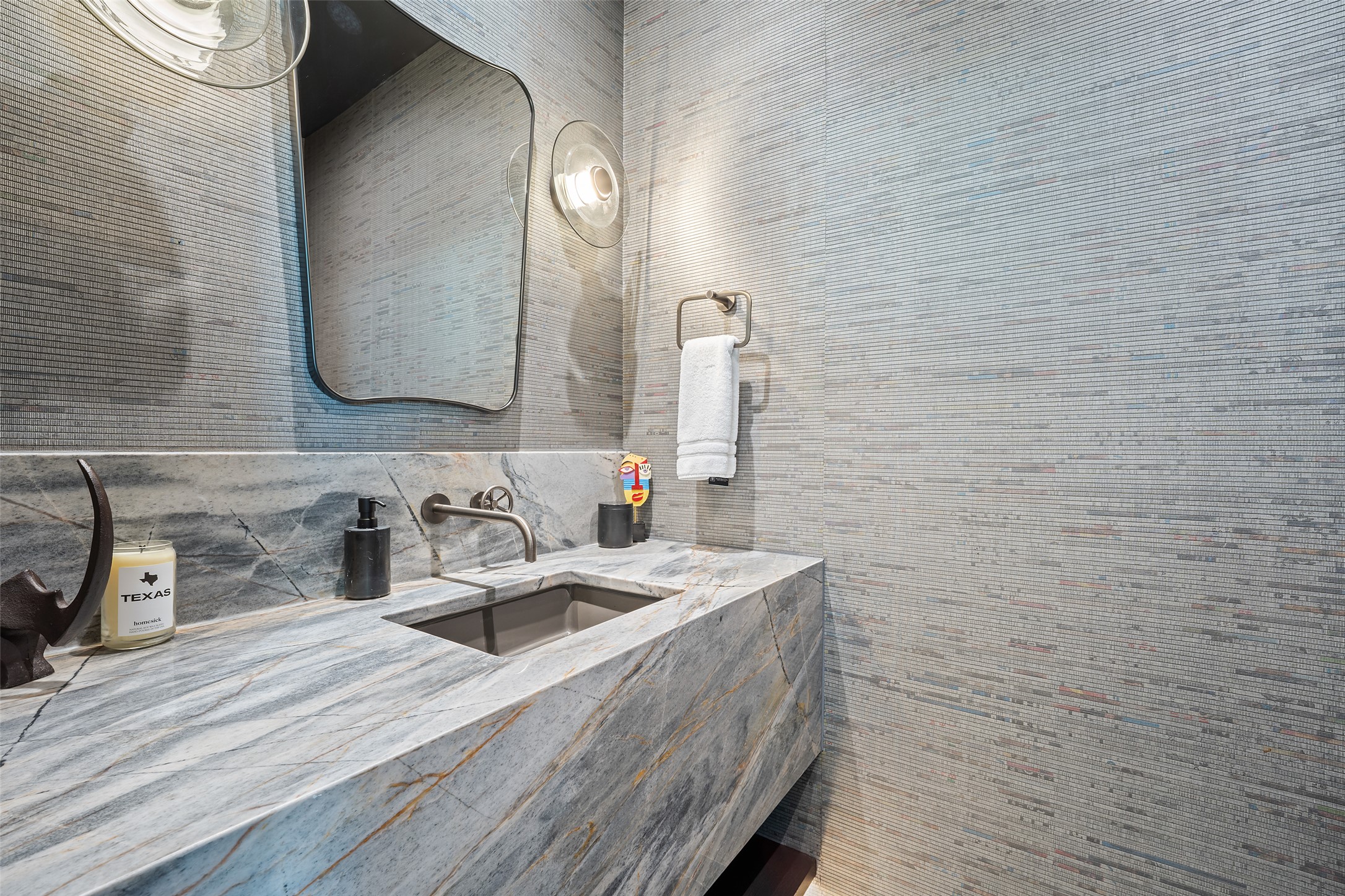 210 Lavaca Street, Unit 2301 Austin, TX 78701 - Photo 34 of 40 a bathroom with a sink and a mirror