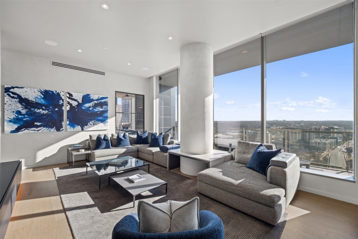 210 Lavaca Street, Unit 2301 Austin, TX 78701 - Photo 9 of 40 a living room with furniture and a large window