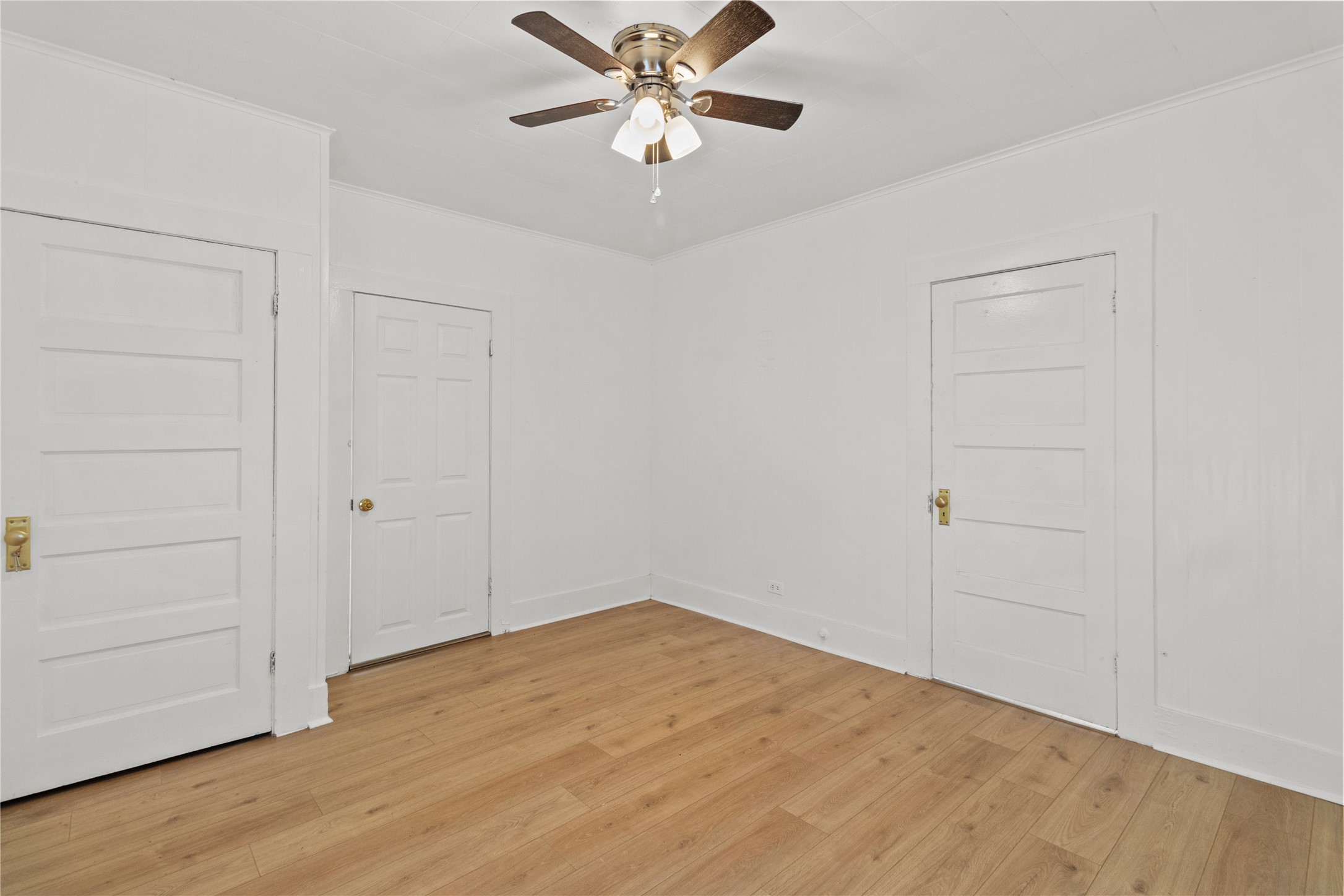 706 East Hunnicutt Street Baytown, TX 77520 - Photo 7 of 12 wooden floor in an empty room