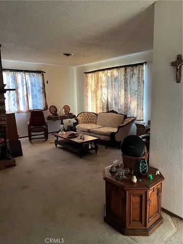 a living room with furniture and window
