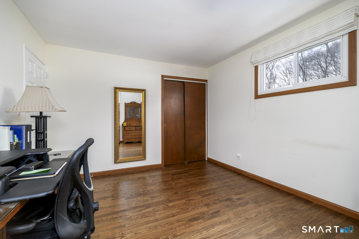 63 Alpine Street Stamford, CT 06905 - Photo 11 of 22 a view of workspace with furniture and wooden floor