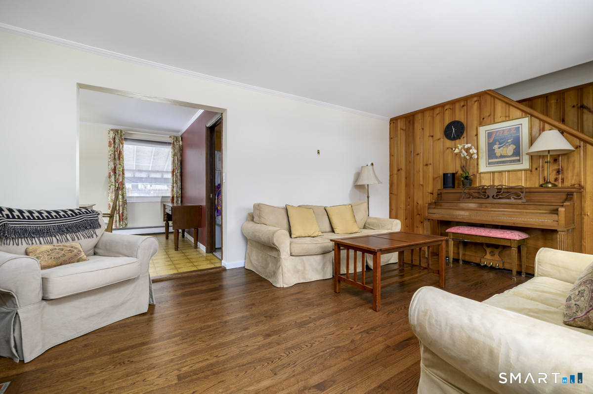 63 Alpine Street Stamford, CT 06905 - Photo 4 of 22 a living room with furniture and a wooden floor