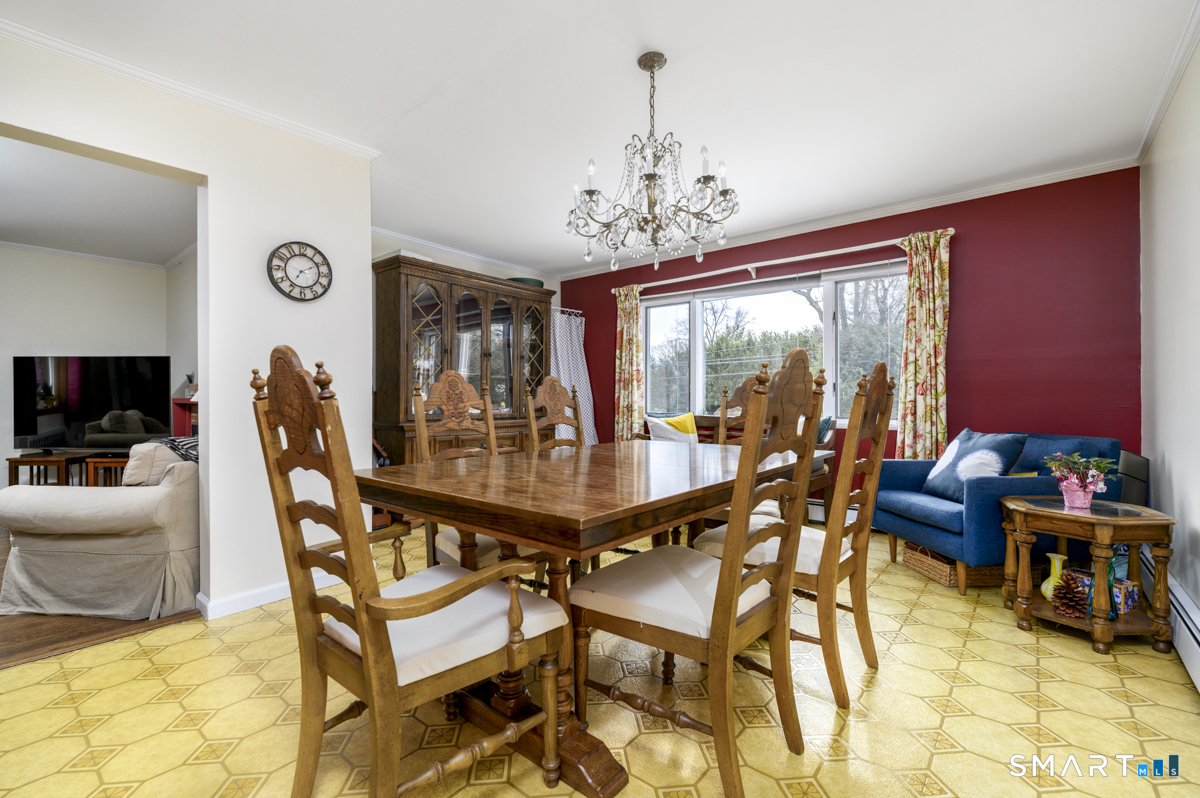 63 Alpine Street Stamford, CT 06905 - Photo 6 of 22 a view of a dining room with furniture window and outside view