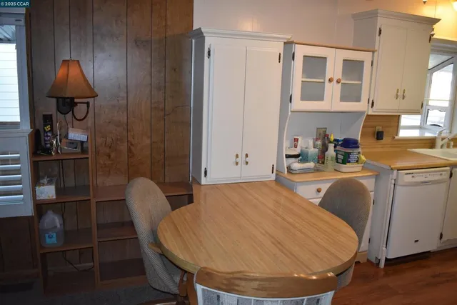 a workspace with furniture and wooden floor