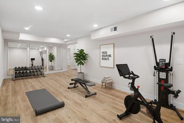 a view of a wooden door of the house