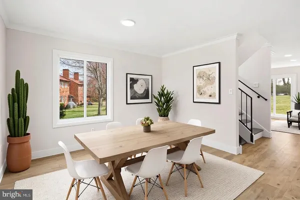 a kitchen with a stove a sink and a microwave