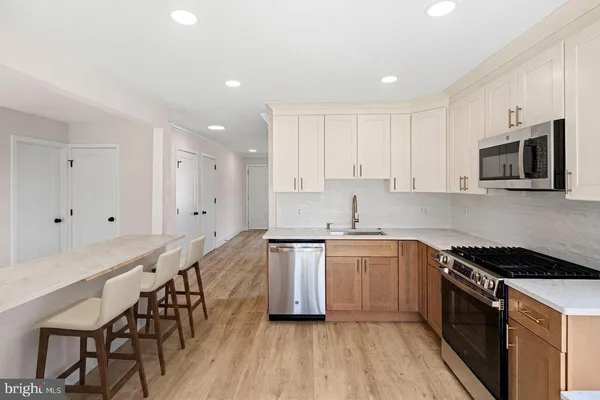 a view of bathroom with dual sinks