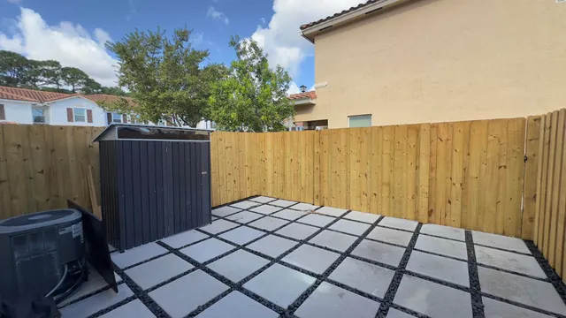 a view of a house with a patio