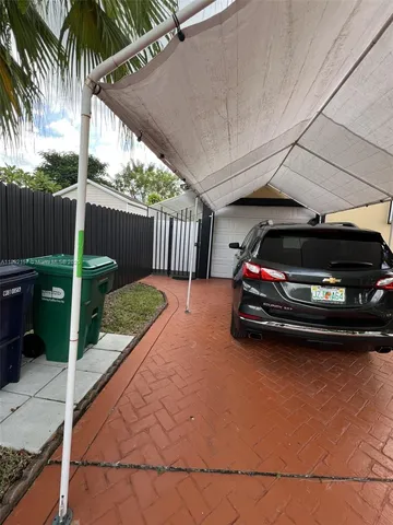 a car parked in front of a house