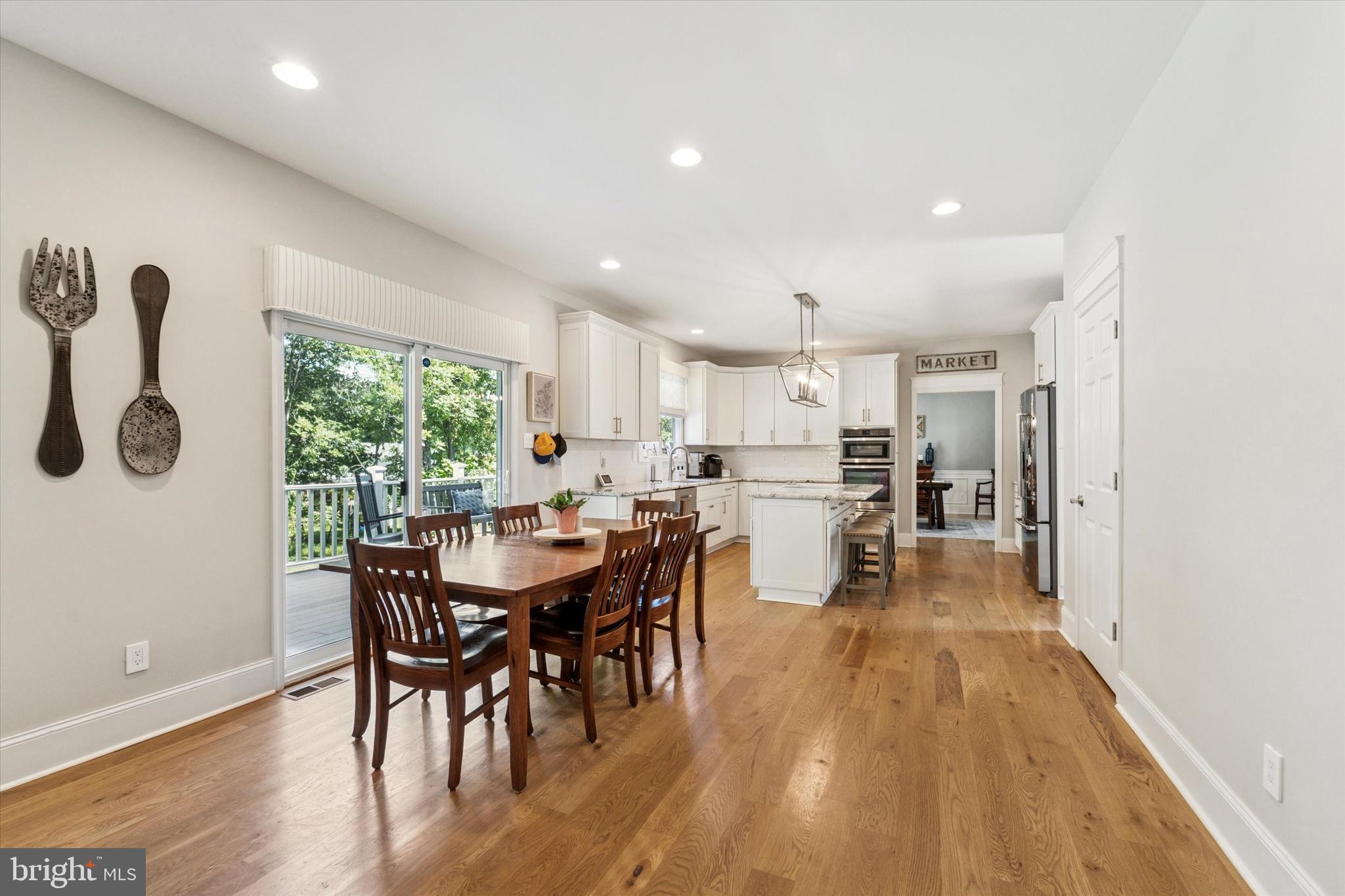 5 Stoney End Road Broomall, PA 19008 - Photo 19 of 48 a view of a dining room with furniture and wooden floor