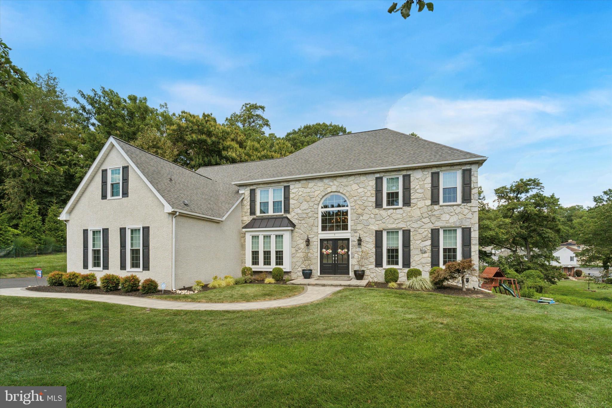 5 Stoney End Road Broomall, PA 19008 - Photo 2 of 48 a front view of a house with a yard