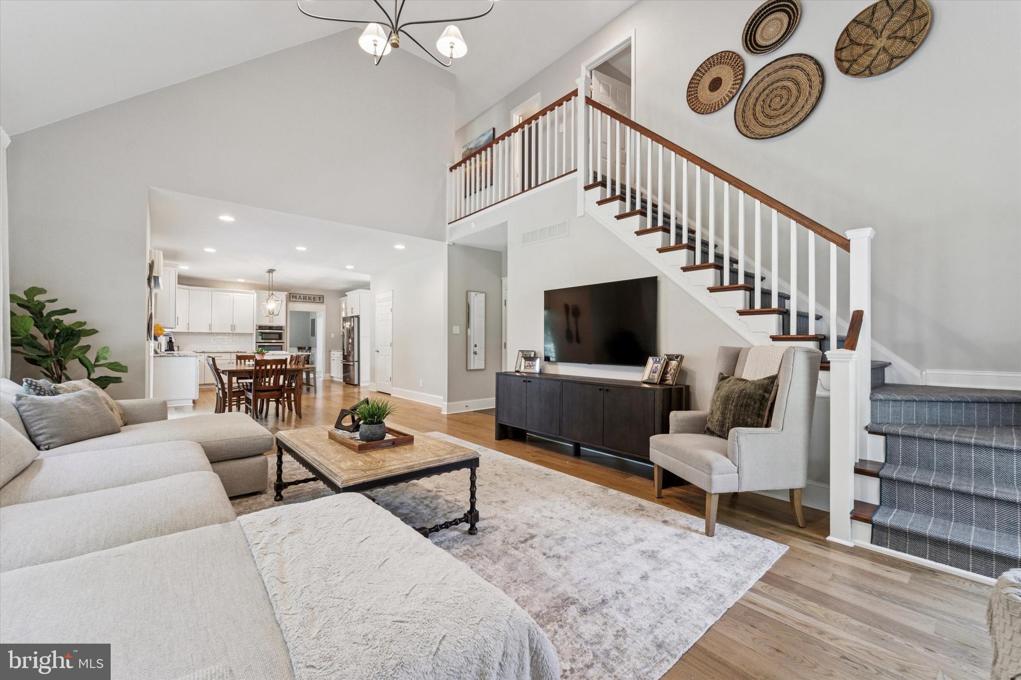 5 Stoney End Road Broomall, PA 19008 - Photo 22 of 48 a living room with furniture and a flat screen tv