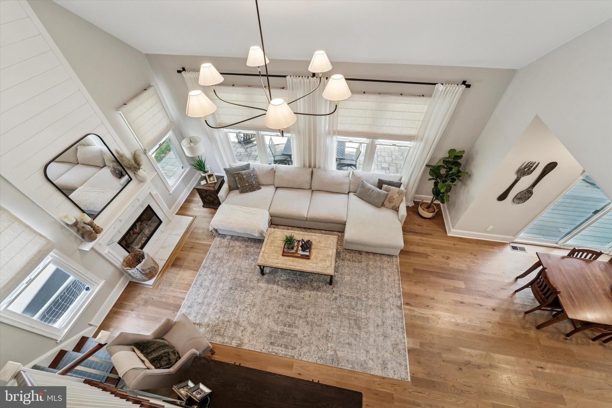 5 Stoney End Road Broomall, PA 19008 - Photo 24 of 48 a living room with furniture and a chandelier