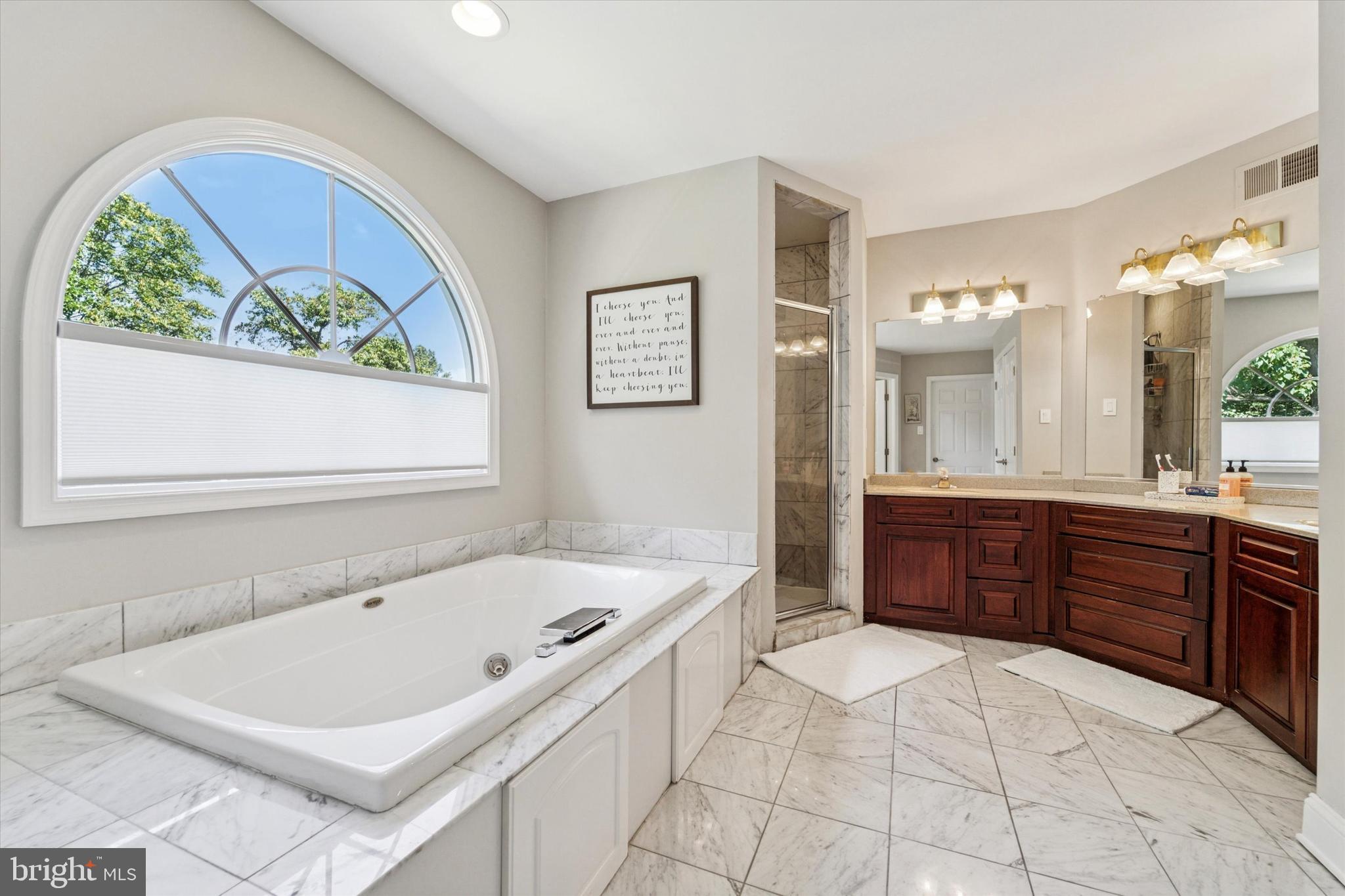 5 Stoney End Road Broomall, PA 19008 - Photo 31 of 48 a spacious bathroom with a tub sink and mirror
