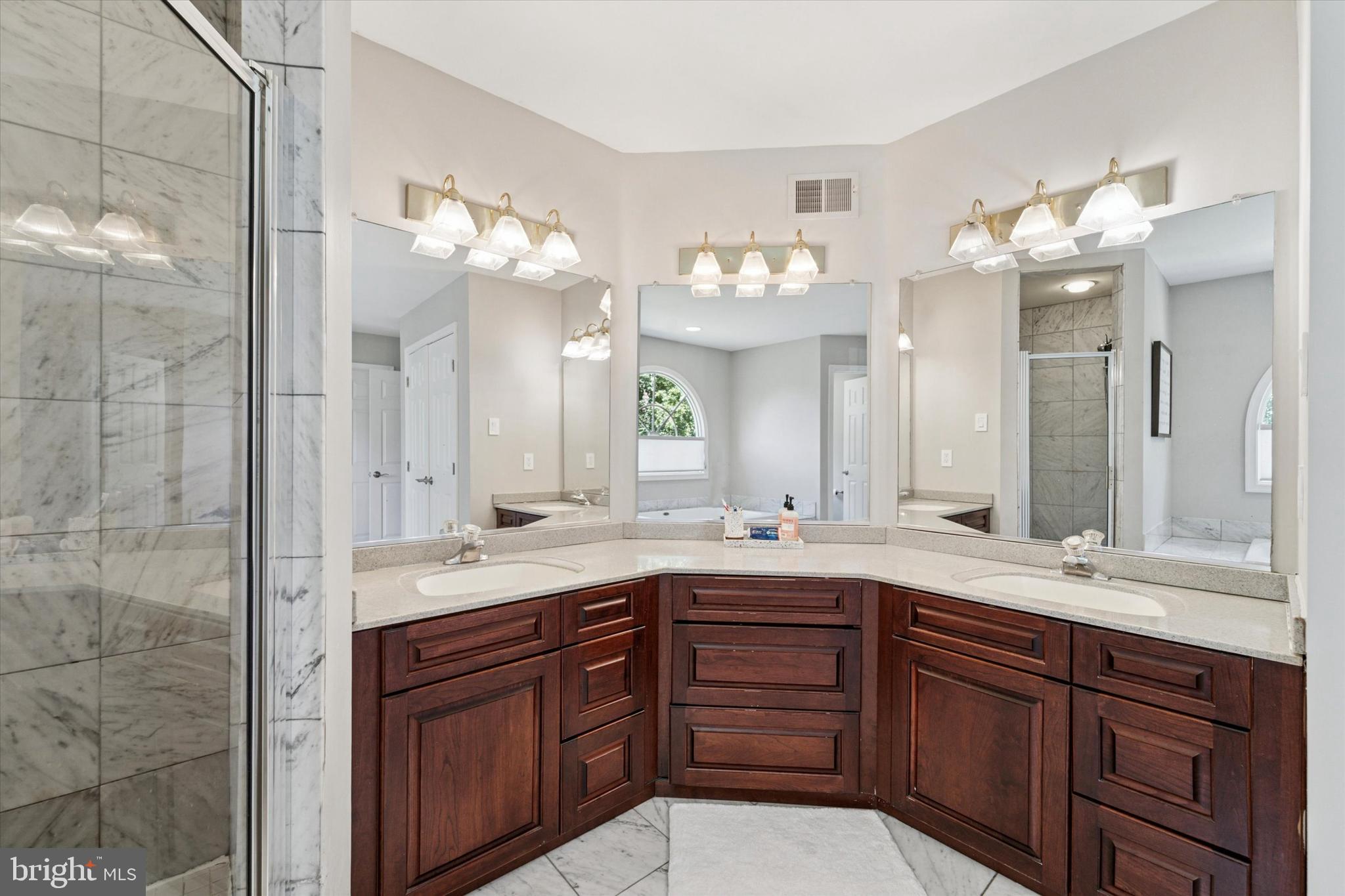 5 Stoney End Road Broomall, PA 19008 - Photo 32 of 48 a bathroom with a double vanity sink mirror and double