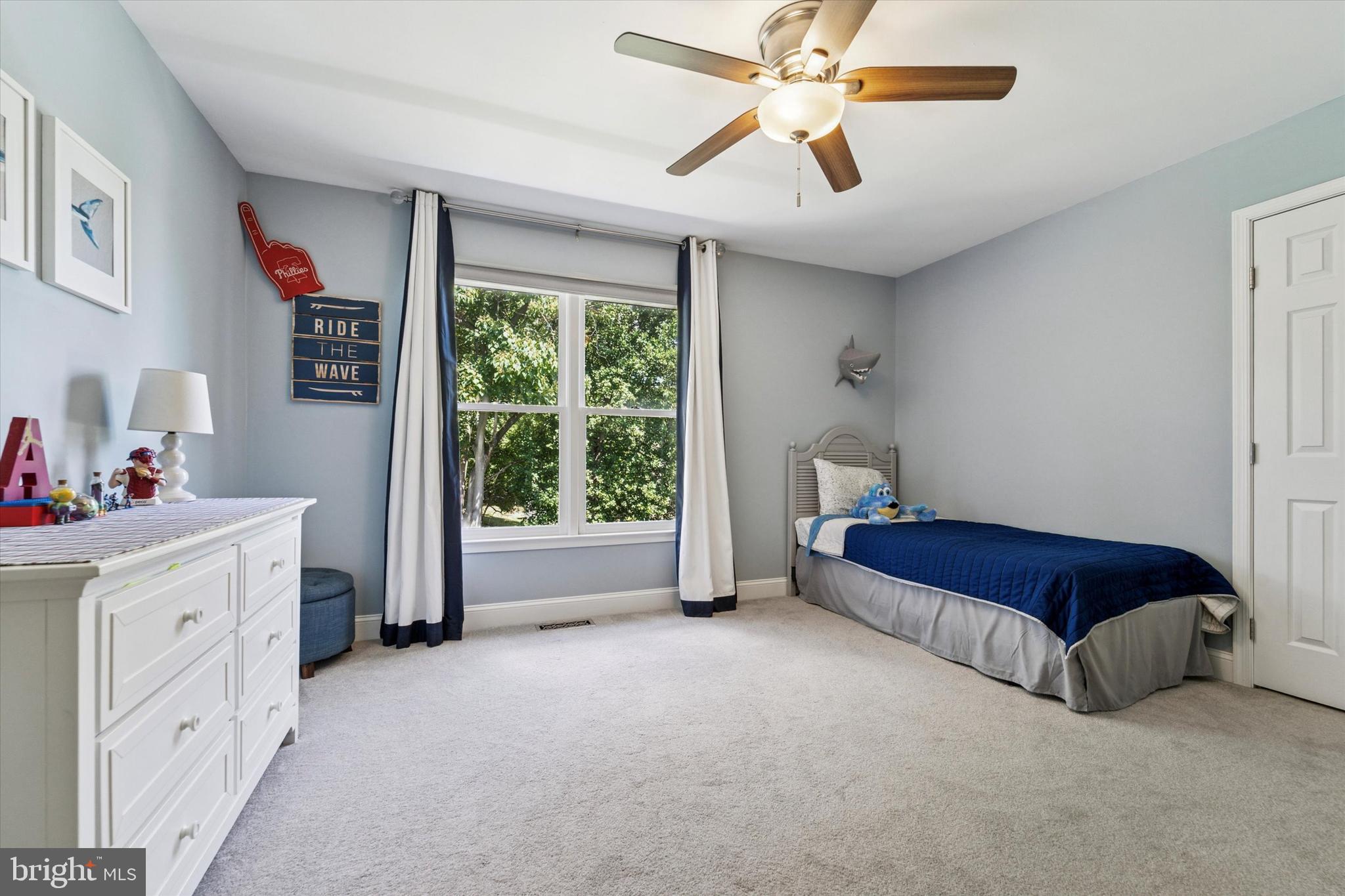 5 Stoney End Road Broomall, PA 19008 - Photo 40 of 48 a spacious bedroom with a bed and a chandelier