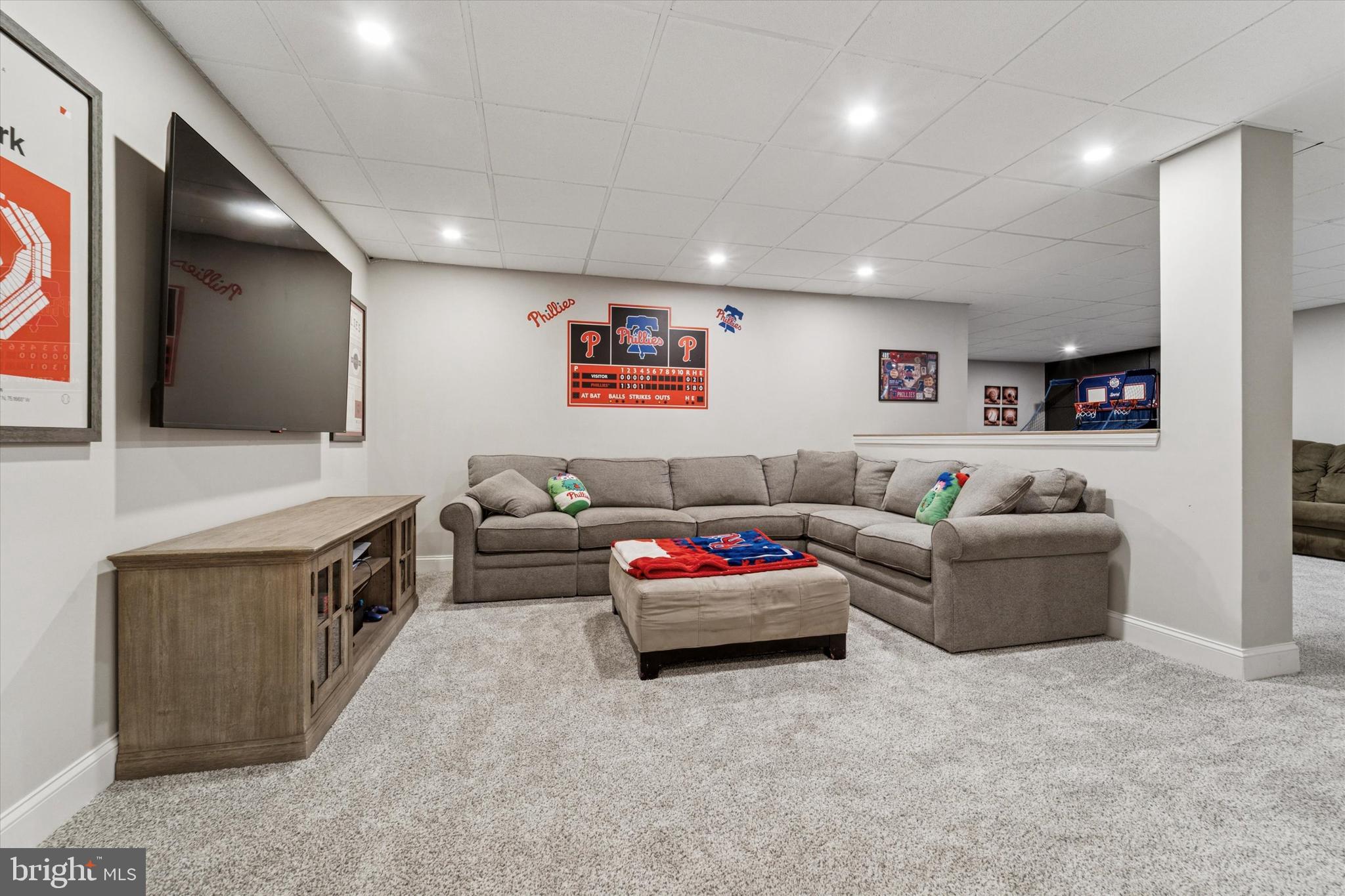 5 Stoney End Road Broomall, PA 19008 - Photo 42 of 48 a living room with furniture and a flat screen tv