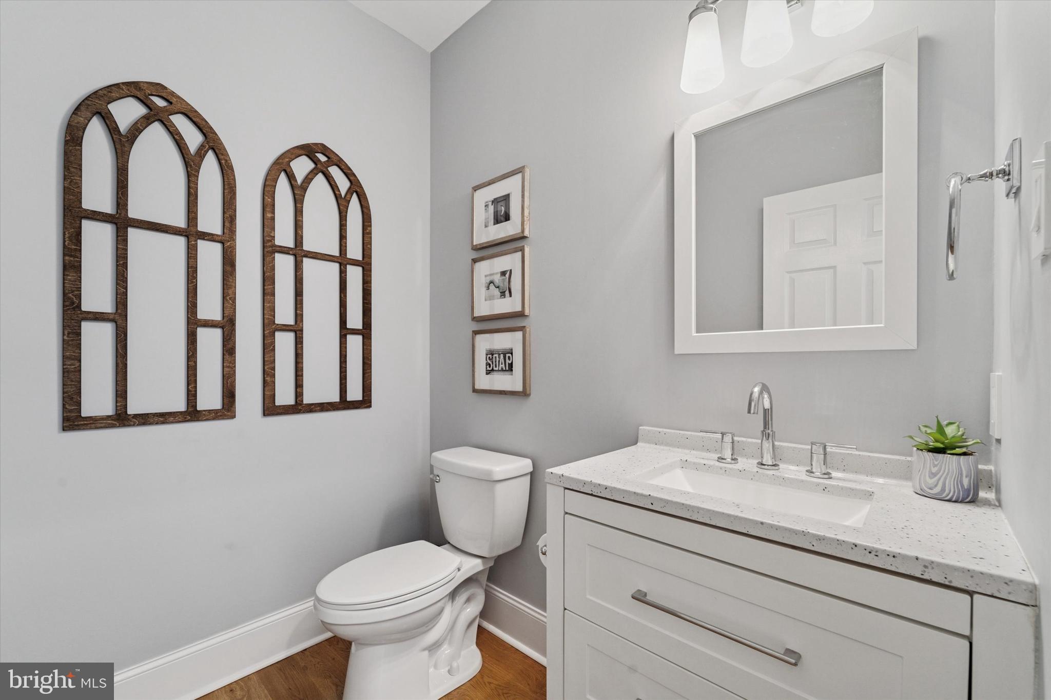 5 Stoney End Road Broomall, PA 19008 - Photo 6 of 48 a bathroom with a sink toilet and a mirror
