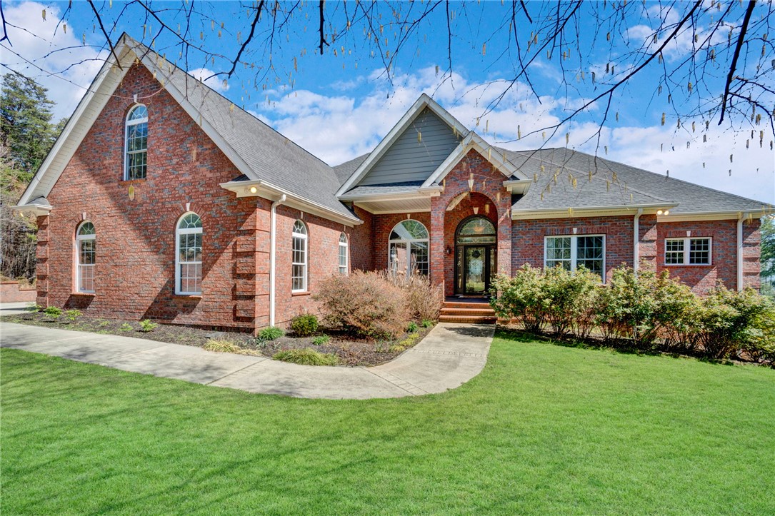 603 Tamassee Ridge Way Salem, SC 29676 - Photo 2 of 46 This classic brick residence features an inviting front walkway and mature landscaping.