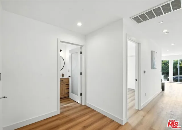 a view of entryway with wooden floor