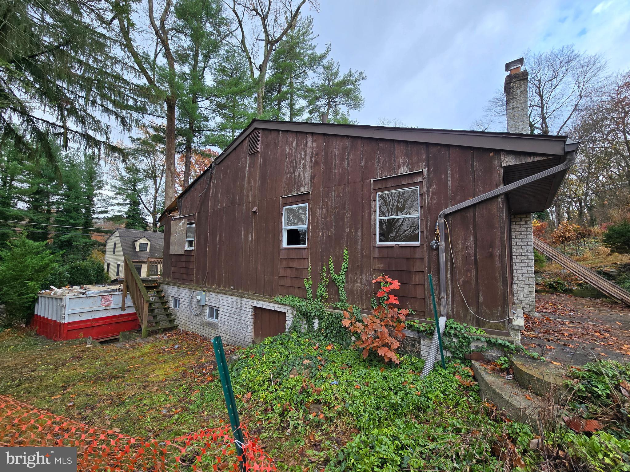 11 Spruce Road Newtown Square, PA 19073 - Photo 7 of 35 a backyard of a house with wooden floors table and chairs