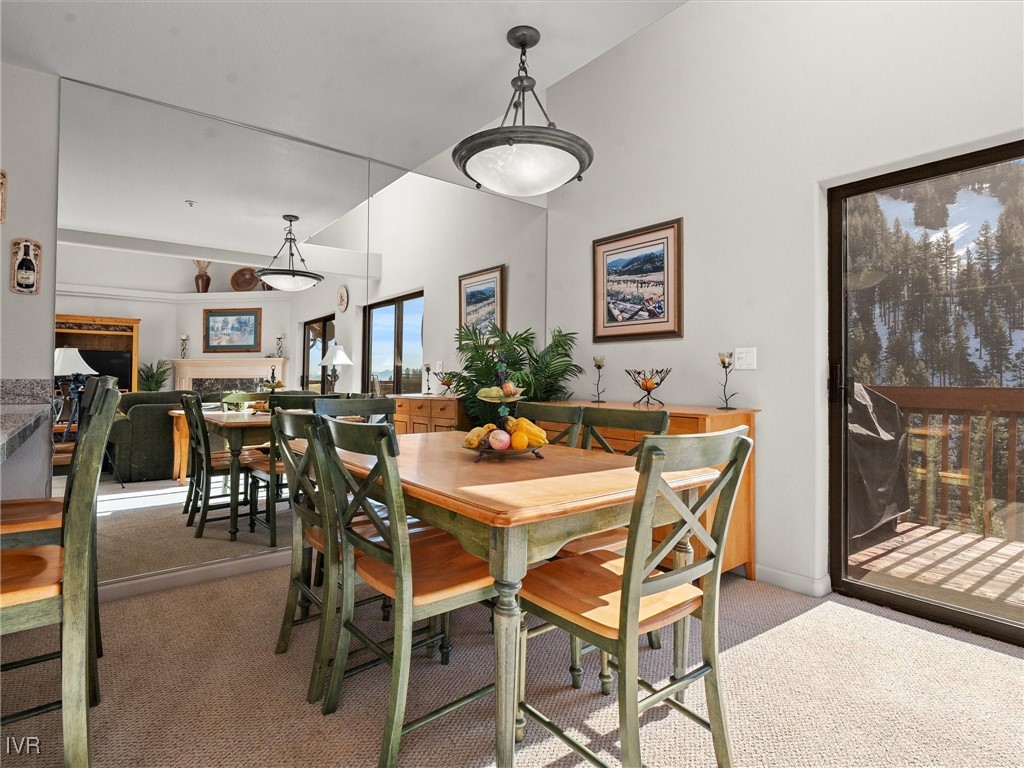 400 Fairview Boulevard, Unit 173 Incline Village, NV 89451 - Photo 13 of 34 a dining room with furniture a painting and a chandelier