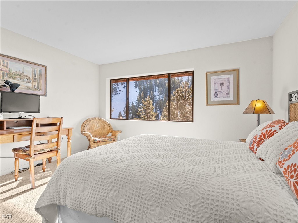 400 Fairview Boulevard, Unit 173 Incline Village, NV 89451 - Photo 16 of 34 a bedroom with a bed and a window
