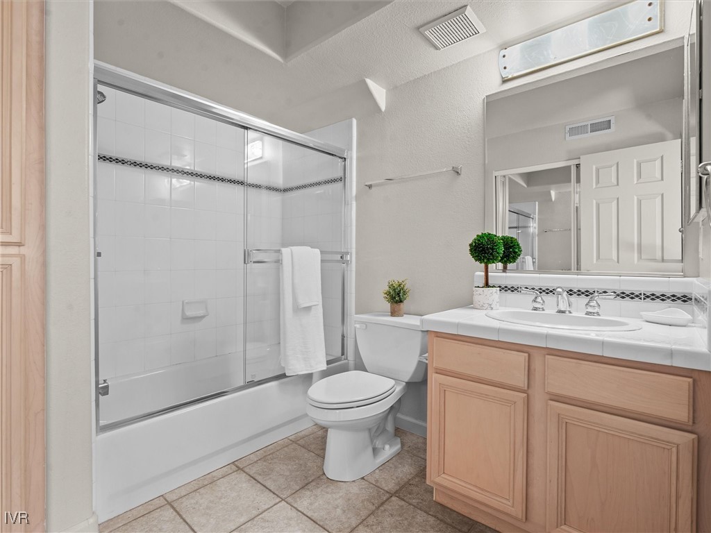 400 Fairview Boulevard, Unit 173 Incline Village, NV 89451 - Photo 17 of 34 a bathroom with a granite countertop sink a toilet and shower