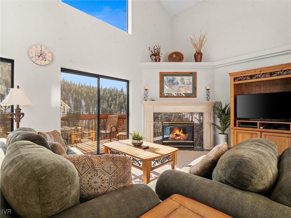 400 Fairview Boulevard, Unit 173 Incline Village, NV 89451 - Photo 7 of 34 a living room with furniture fireplace and flat screen tv