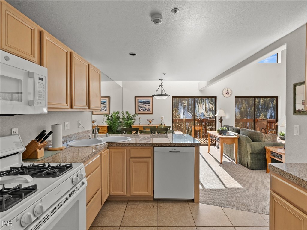 400 Fairview Boulevard, Unit 173 Incline Village, NV 89451 - Photo 9 of 34 a kitchen with a sink stove and cabinets