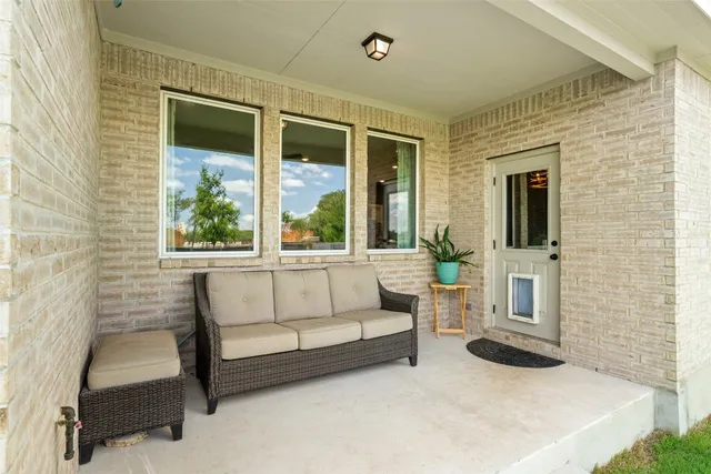 an aerial view of a house with a garden