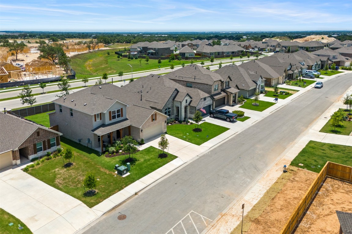 1009 Dog Iron Street Georgetown, TX 78633 - Photo 28 of 39 an aerial view of residential houses with outdoor space and ocean view