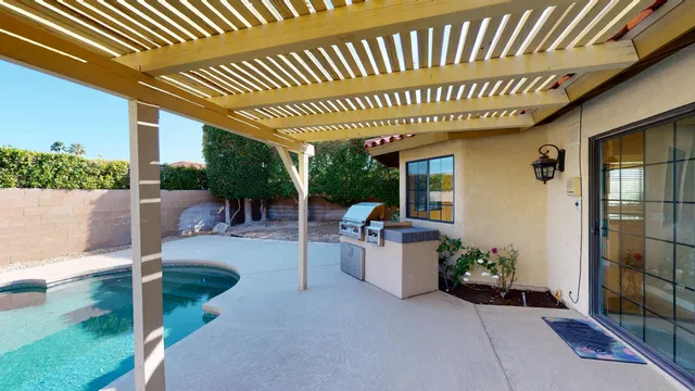 a view of a house with a swimming pool