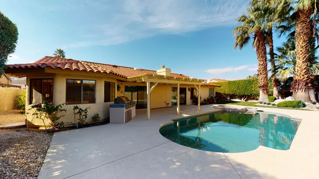 a front view of a house with patio