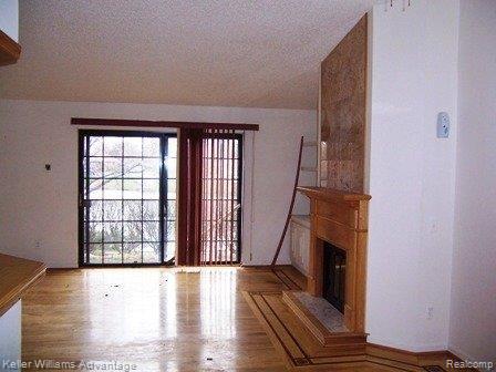22207 Pondview Novi, MI 48375 - Photo 3 of 18 Front Room and Fireplace 3