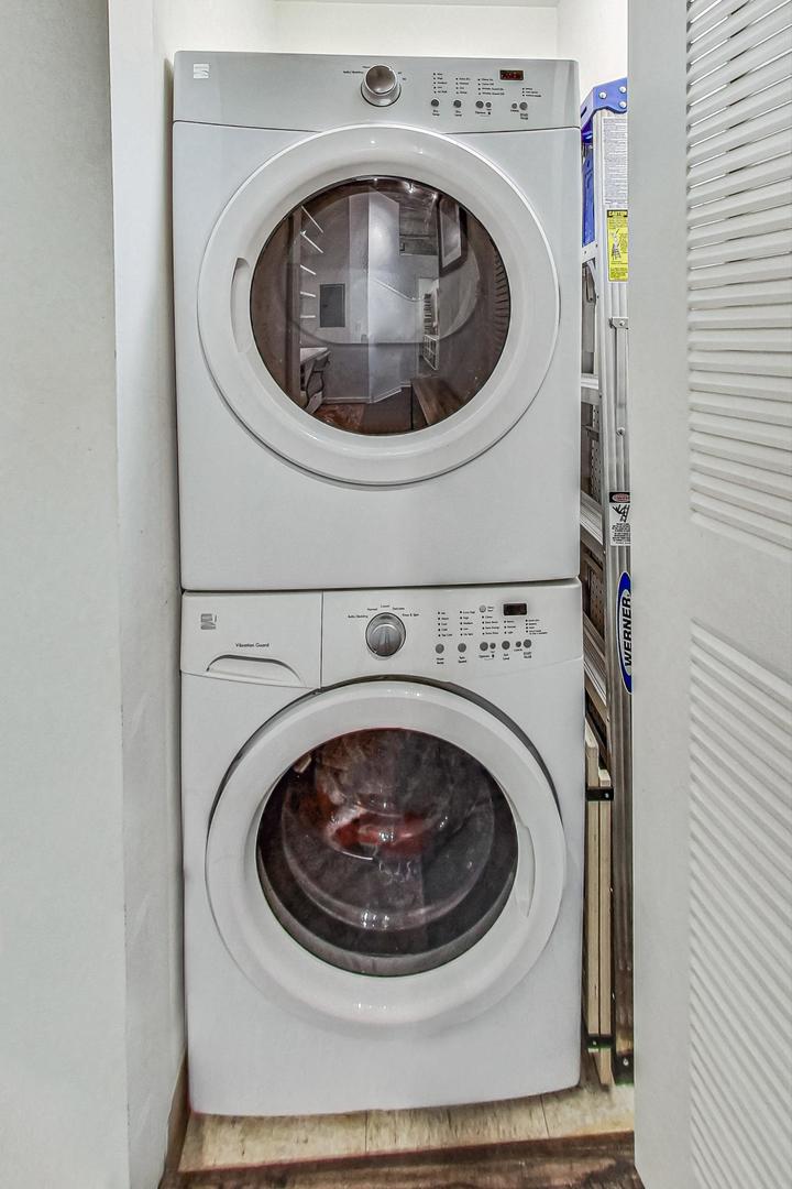 1111 West 14th Place, Unit 110 Chicago, IL 60608 - Photo 16 of 24 a utility room with dryer and washer