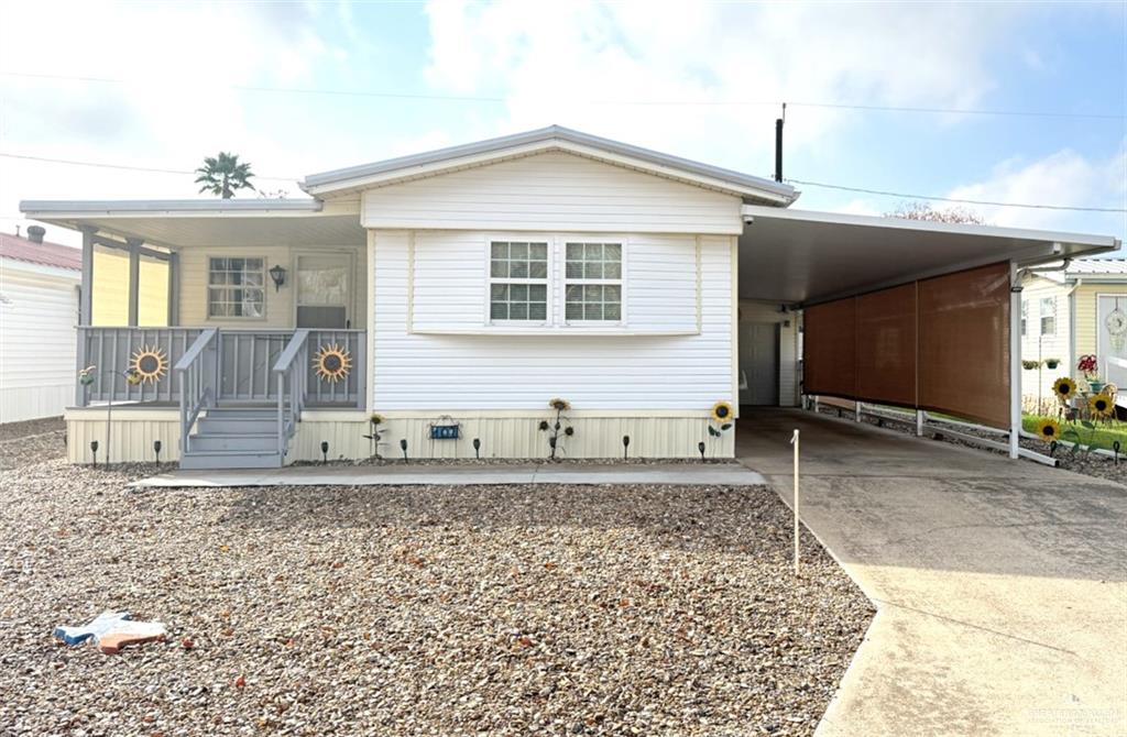 107 Axle Drive Mission, TX 78574 - Photo 1 of 1 a front view of a house with a yard