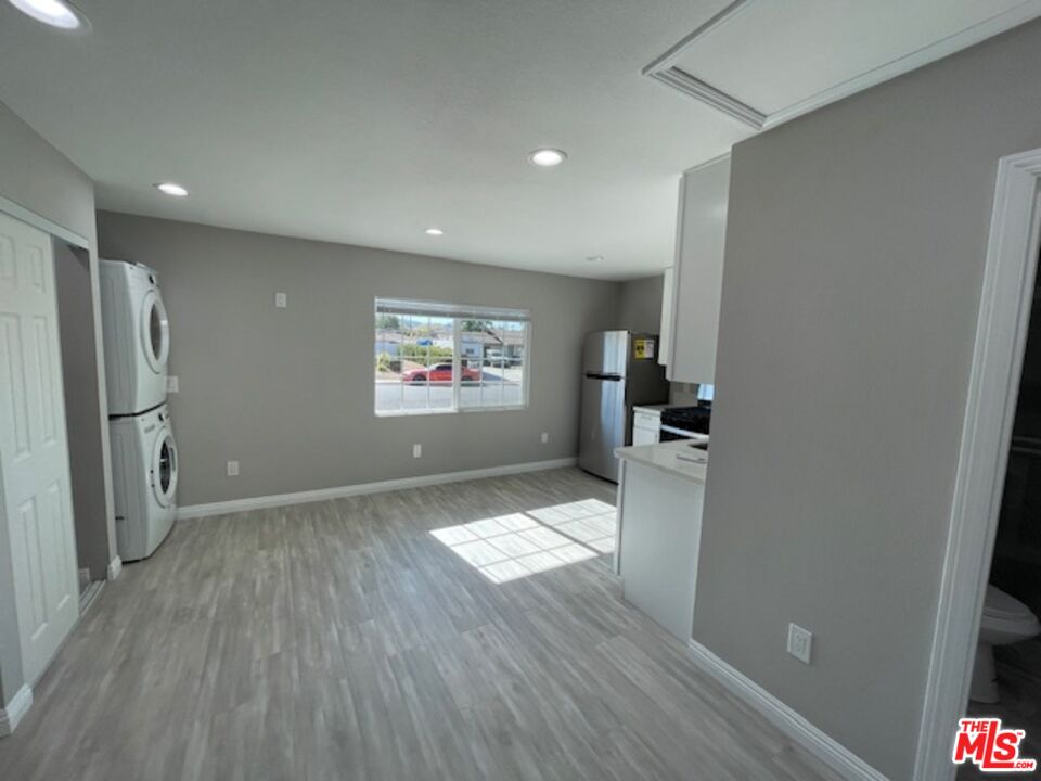 2615 Elizondo Avenue, Unit 2 Simi Valley, CA 93065 - Photo 5 of 20 a view of hallway with wooden floor and a window