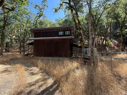 a view of a yard covered in snow