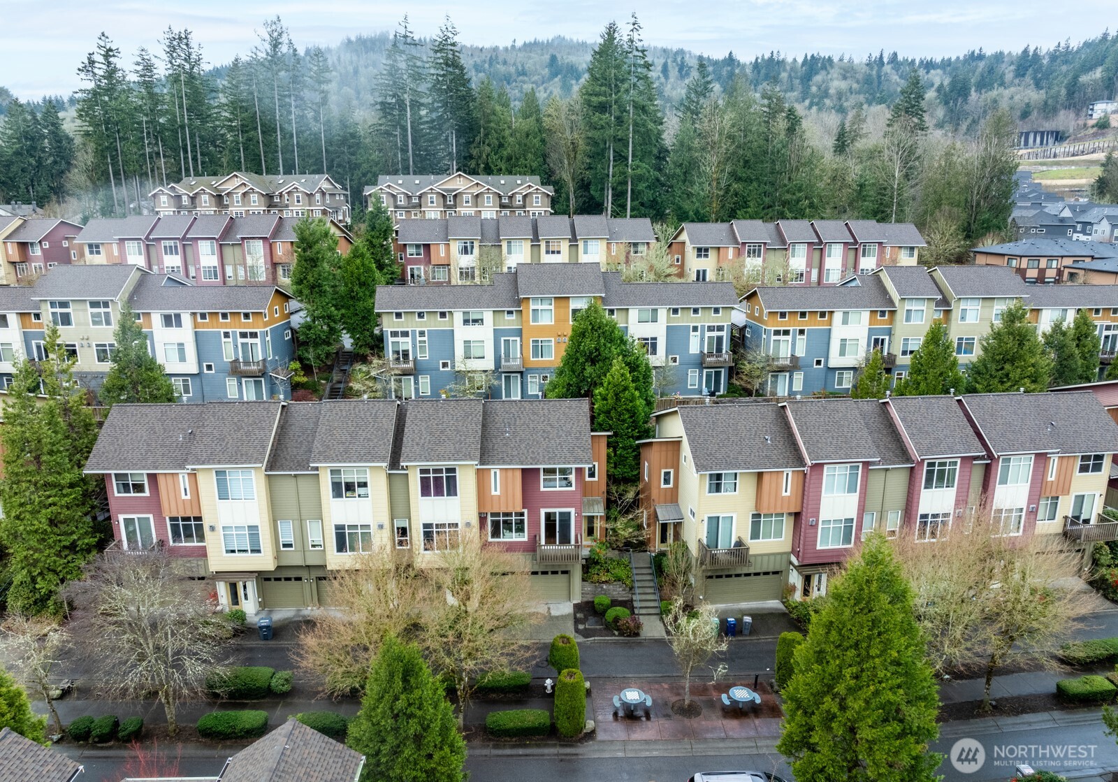 133 Cougar Ridge Road Northwest, Unit 1405 Issaquah, WA 98027 - Photo 23 of 30 a aerial view of a town with large trees