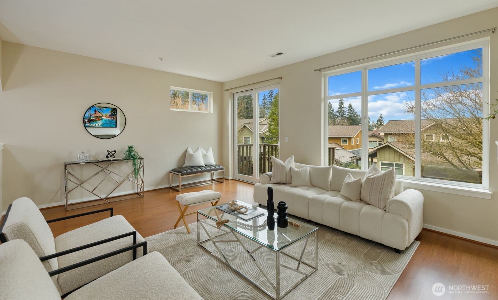 133 Cougar Ridge Road Northwest, Unit 1405 Issaquah, WA 98027 - Photo 4 of 30 a living room with furniture a rug and a large window