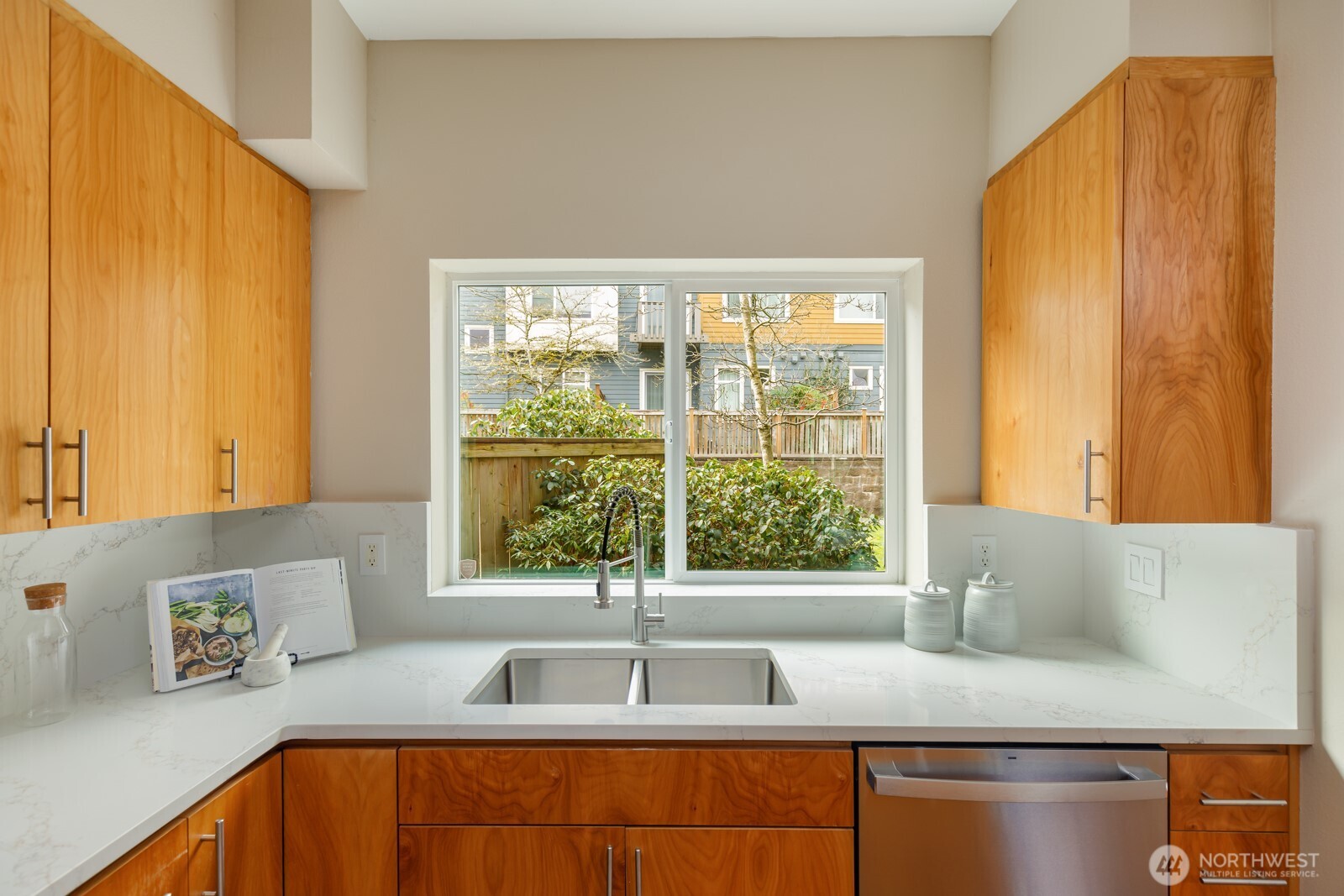 133 Cougar Ridge Road Northwest, Unit 1405 Issaquah, WA 98027 - Photo 9 of 30 a kitchen with a sink and a window