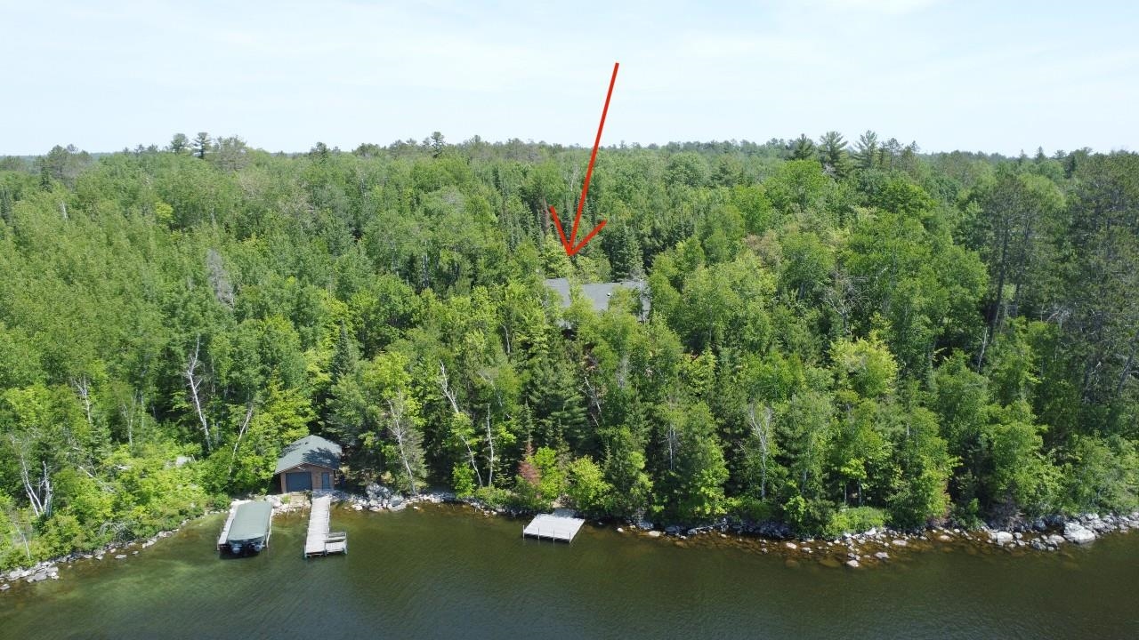 2357 Retreat Lodge Road Cook, MN 55723 - Photo 3 of 45 View of property location with a forest and a nearby body of water